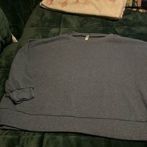 Very soft lightweight sweatshirt by dear Scarlet. Color is a nice soft blue